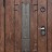 Внешняя сторона двери. Цвет: Лиственница мореная + черная патина. Рисунок: Влагостойкий фрезерованный щит Waterproof veneer с покрытием из шпона + кованая решетка.